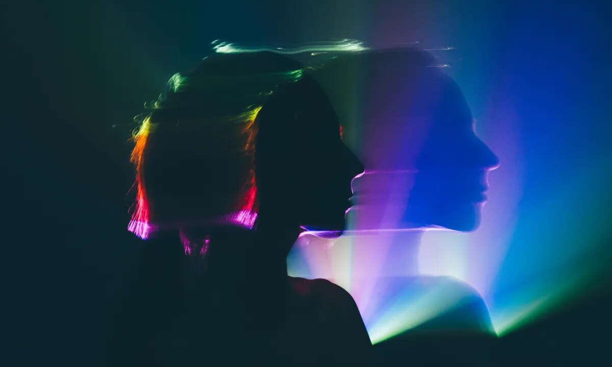 Blurred portrait of a woman taken with long exposure, concept of surrealism and spirituality.