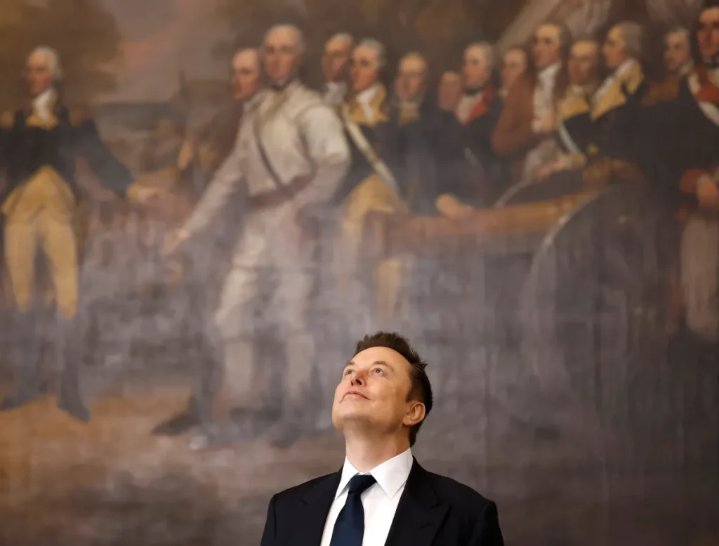 a photo of Elon Musk looking up at the ceiling while standing in front of a historical painting