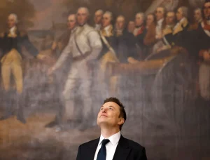 a photo of Elon Musk looking up at the ceiling while standing in front of a historical painting