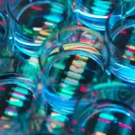 A human sample in a multi well plate ready for genetic analysis with a DNA sequence in the background