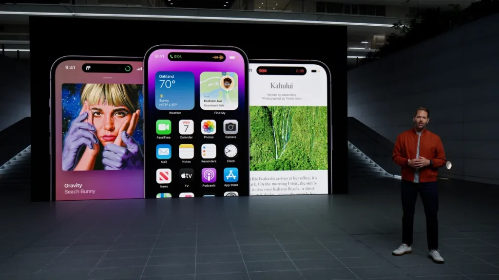 Apple's vice president of human interface design Alan Dye showcases the new Dynamic Island on iPhone 14 Pro and iPhone 14 Pro Max during a special Apple event, as seen in this still image from the keynote video.