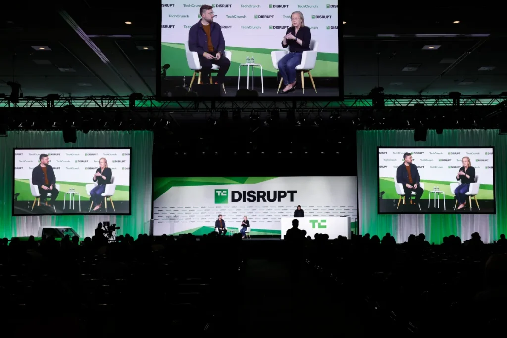 Sean O'Kane and Chris Barman, CEO, Slate Auto, speak onstage during day two of TechCrunch Disrupt 2025 at Moscone Center on October 28, 2025 in San Francisco, California
