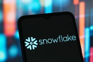 In this photo illustration, the Snowflake logo is seen displayed on a smartphone screen.