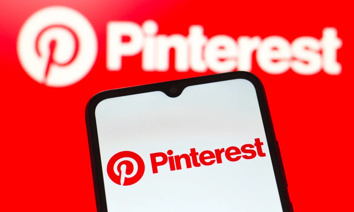 In this photo illustration, the Pinterest logo is seen displayed on a smartphone screen.