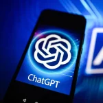 In this photo illustration a Chat GPT logo is seen displayed on a smartphone with Artificial Intelligence (AI) logo in the background.