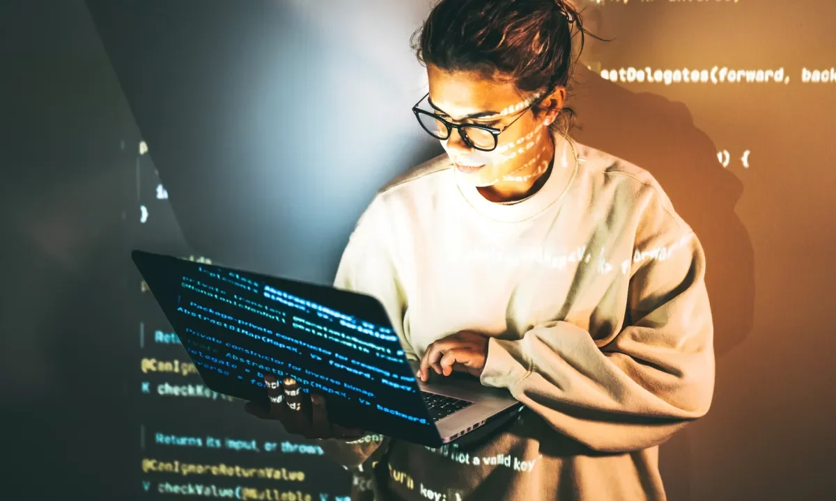 Young woman programming.