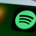 Spotify icon displayed on a phone screen