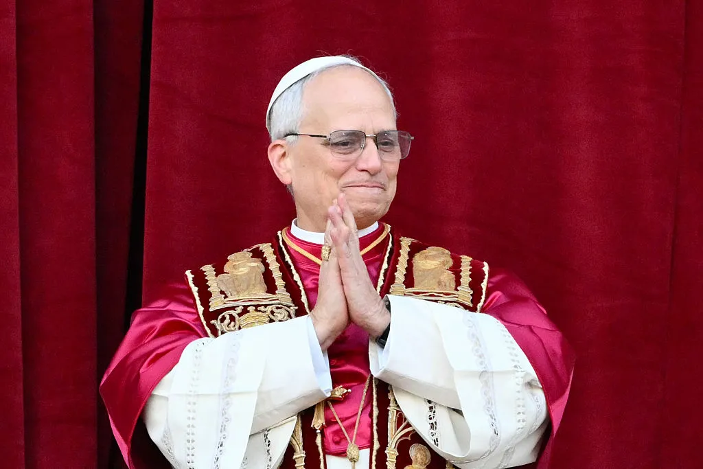 Pope Leo XIV, Robert Prevost arrives on the main central loggia balcony of the St Peter's Basilica for the first time.