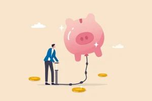 pumping air into a floating piggy bank
