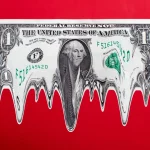 US $1 dollar bill in mid-air, melting