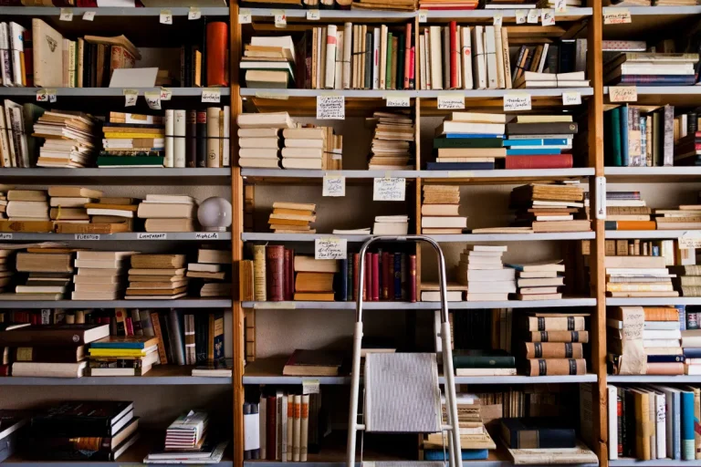 wall of bookshelves stacked with books