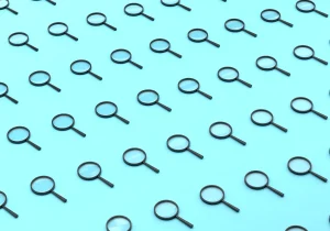 Repeated Magnifying Glass On Blue Background