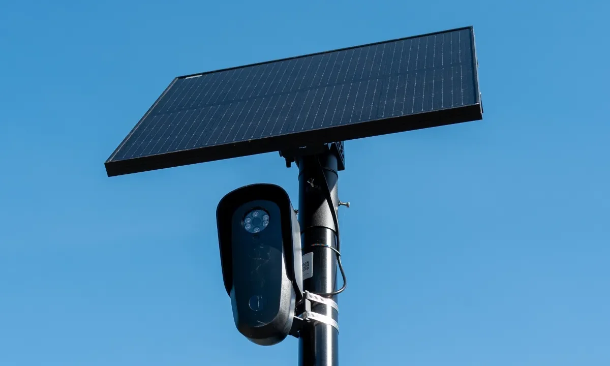 Flock license plate reader and camera with solar panel against a blue sky, Pleasant Hill, California, April 16, 2026.