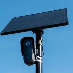 Flock license plate reader and camera with solar panel against a blue sky, Pleasant Hill, California, April 16, 2026.