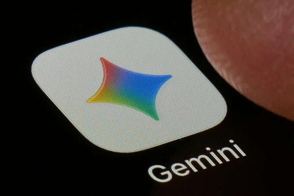 A macro close-up photograph shows the Google Gemini AI app icon