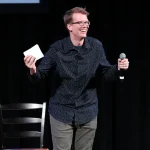 YouTube personality and author Hank Green speaks on stage as he discusses his new book "An Absolutely Remarkable Thing" at The Town Hall on September 25, 2018 in New York City.