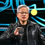 Jensen Huang holds up chip at CES 2025