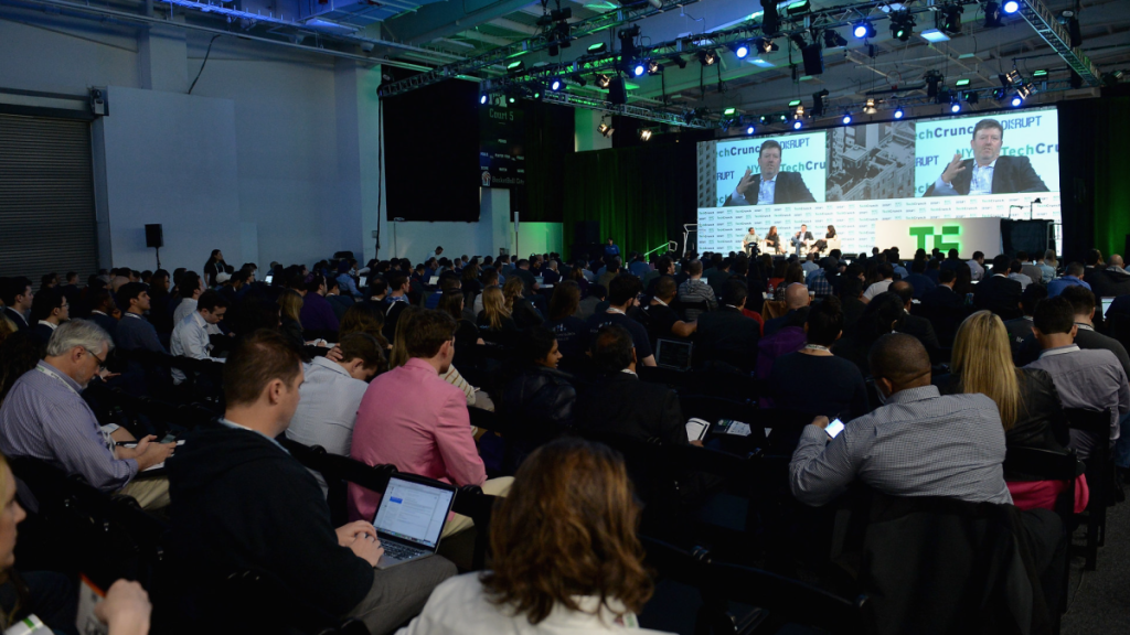 TechCrunch Disrupt 2023 crowd sitting at the Disrupt Stage