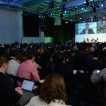 TechCrunch Disrupt 2023 crowd sitting at the Disrupt Stage