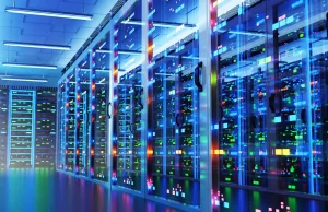 Modern data center with racks of cabinets and colored lights.
