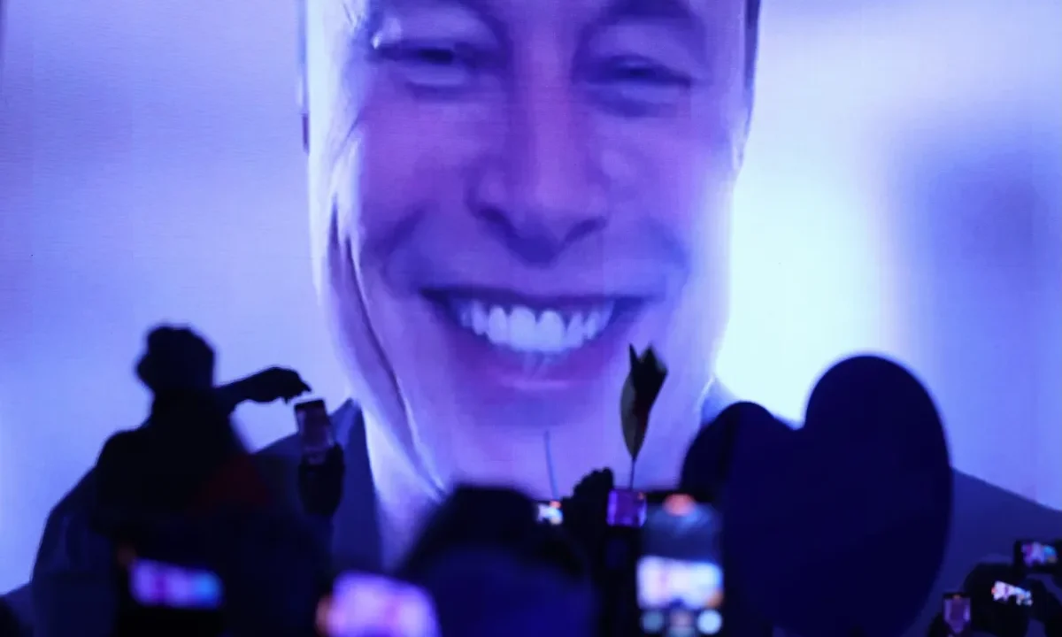 Tech billionaire Elon Musk speaks live via a video transmission during the election campaign launch rally of the far-right Alternative for Germany (AfD) political party on January 25, 2025 in Halle, Germany