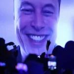 Tech billionaire Elon Musk speaks live via a video transmission during the election campaign launch rally of the far-right Alternative for Germany (AfD) political party on January 25, 2025 in Halle, Germany