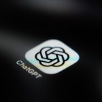 The ChatGPT application icon is displayed on a smartphone screen.