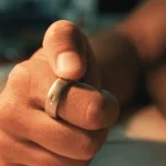 Natura ring on finger
