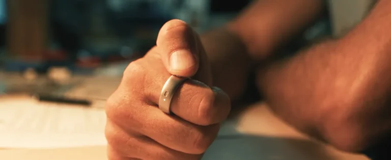 Natura ring on finger